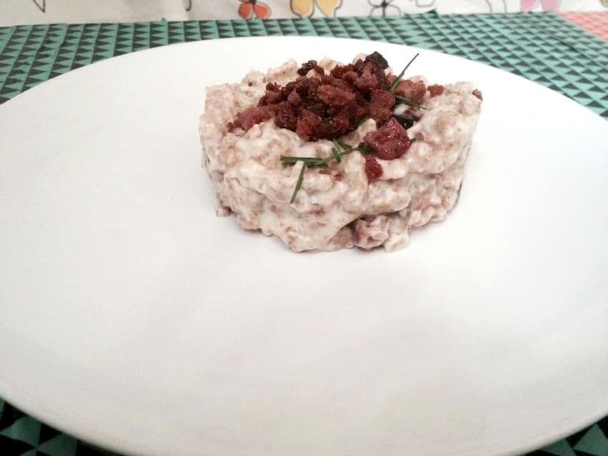 Wholewheat dumplings (spatzle) with strawberry tree honey, bacon and cream - Germany