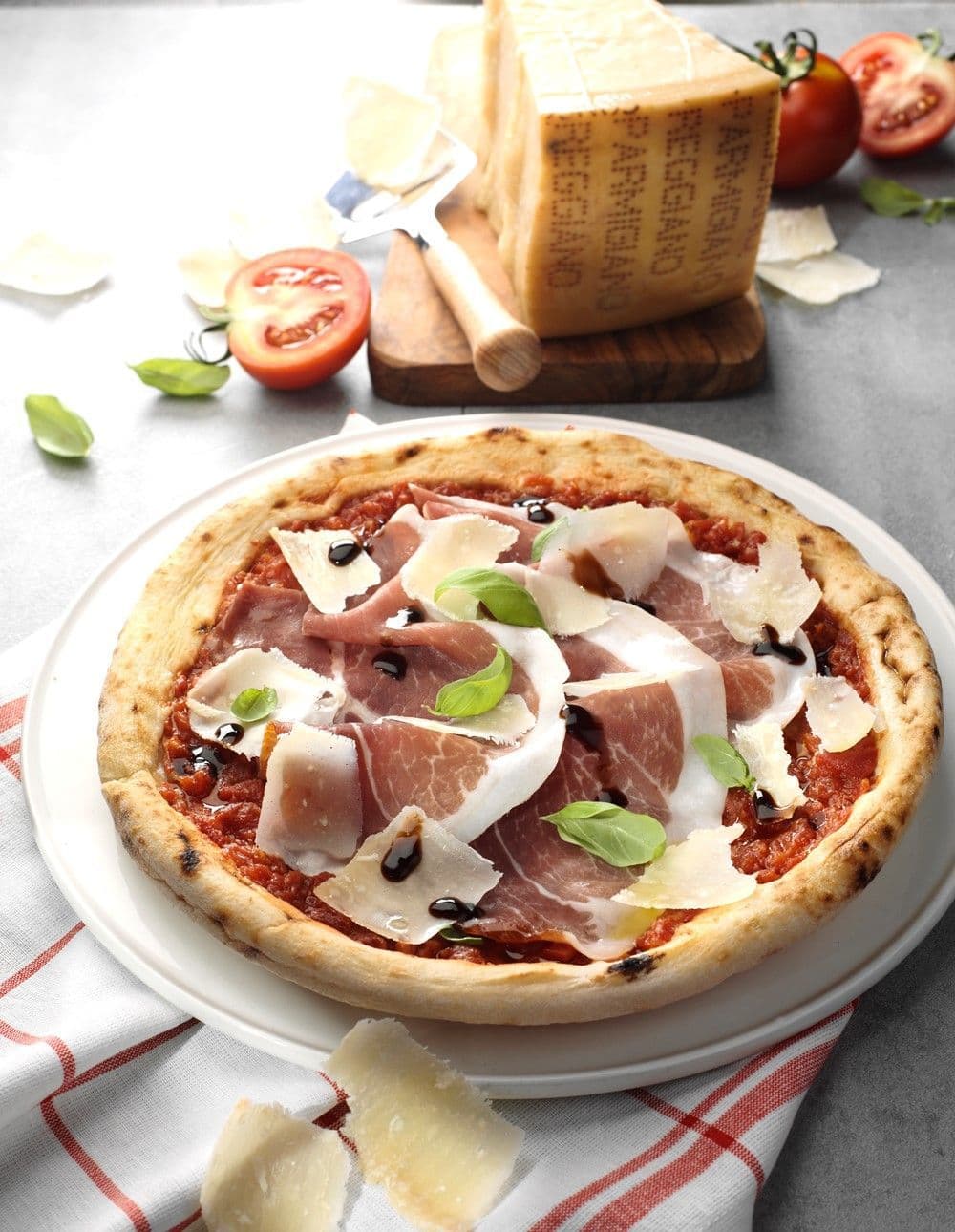 Parmigiano Reggiano, Parma ham and basil pizza