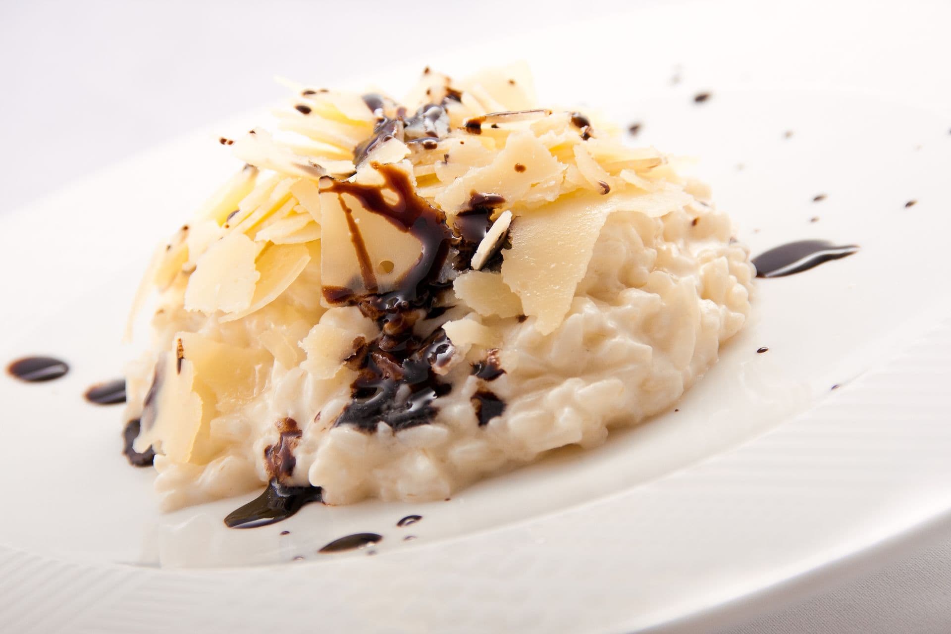 Risotto al Parmigiano Reggiano e aglio nero